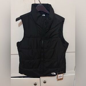 The North Face Dark Puffer Vest size womens medium new with tag